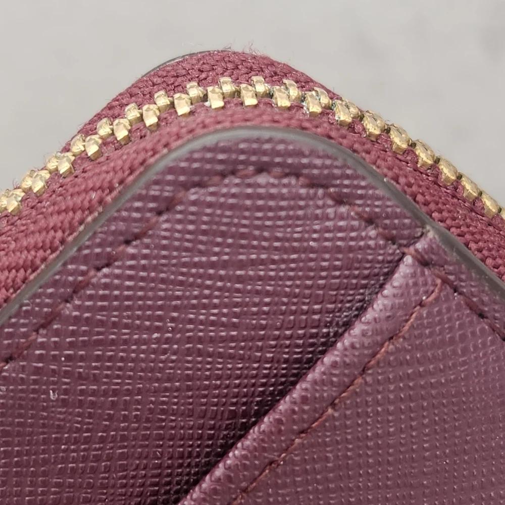 Kate Spade Zip Around Wallet Plum Purple Saffiano Leather Neda Laurel Way Logo